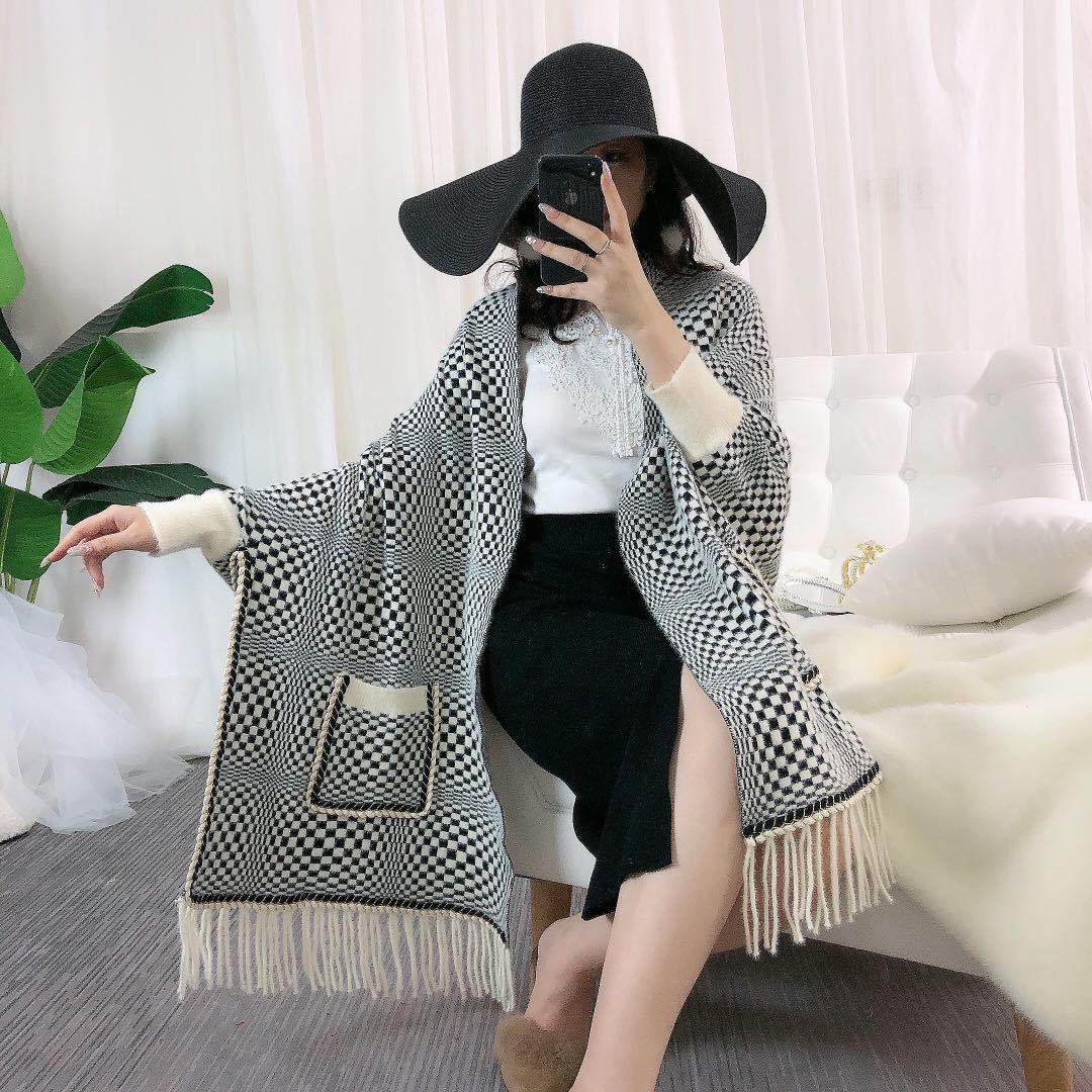 Faux mink velvet cape, black-and-white check pattern with fringed cuffs and pocket detail