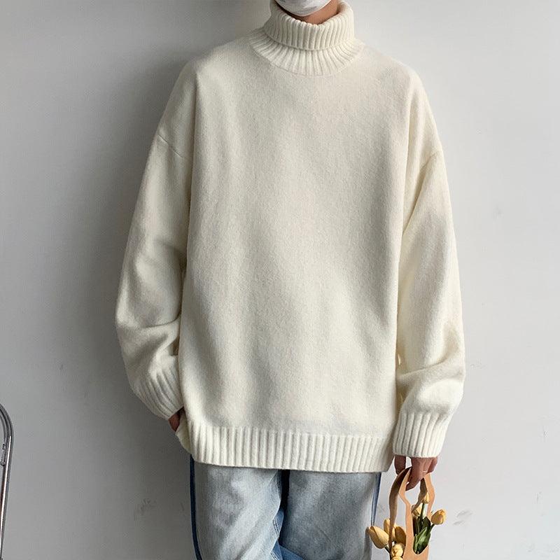 White loose turtleneck sweater with ribbed collar and cuffs