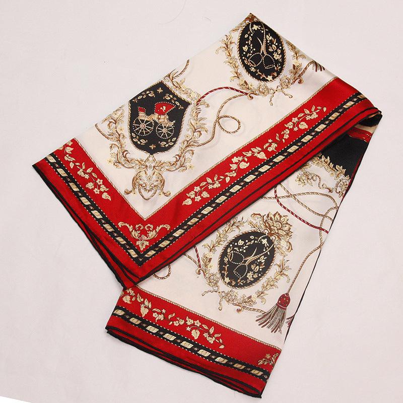 Cream silk square scarf with red border and gold-toned ornate motifs