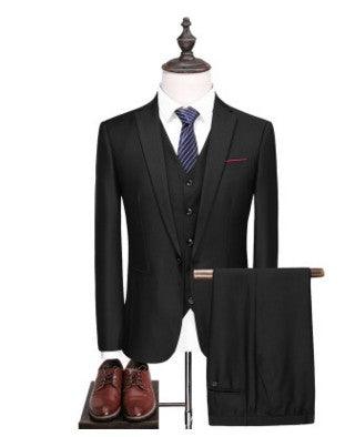 Mens black suit jacket with matching vest, blue striped tie, and black trousers set