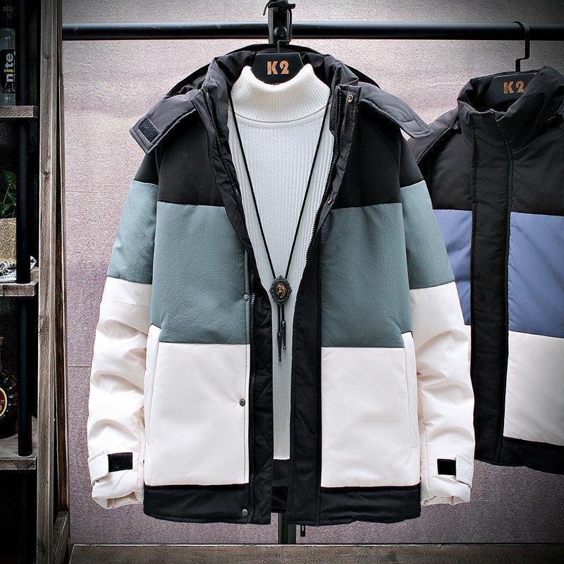 Men’s hooded color-block puffer jacket with teal, black, and white panels