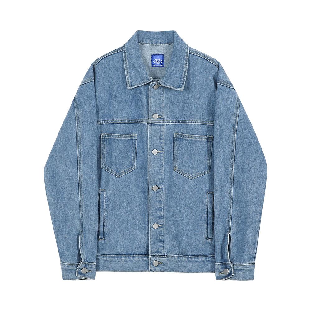 Light blue denim jacket with button-front placket, flap chest pockets, and fold-over collar