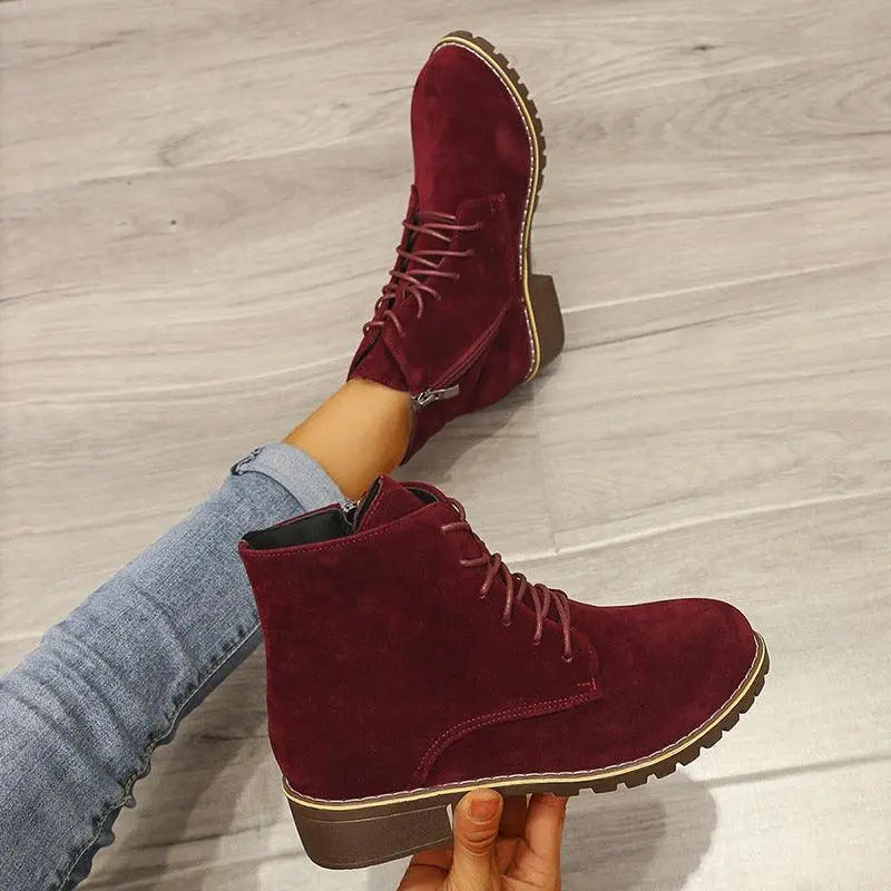 Women’s burgundy suede lace-up ankle boots with side zipper and contrast sole trim