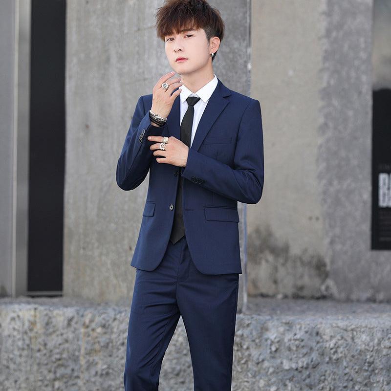 Men's navy single-breasted blazer with matching vest and trousers