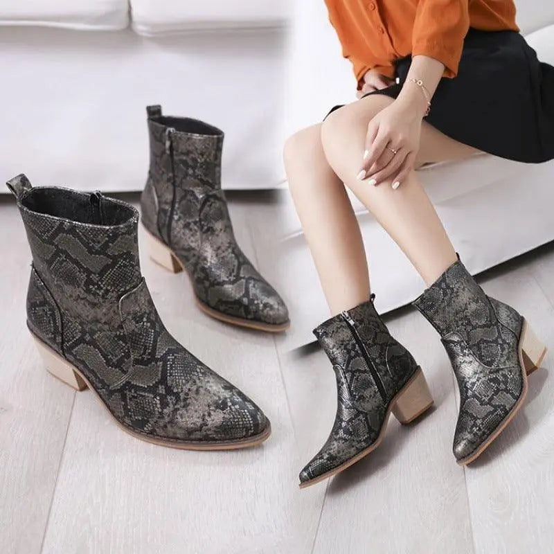 Dark gray snakeskin short ankle boots with block heel and side zipper, pull-on style.