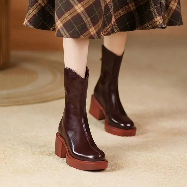 Wine red chunky-heel ankle boots with glossy finish and side pull tab