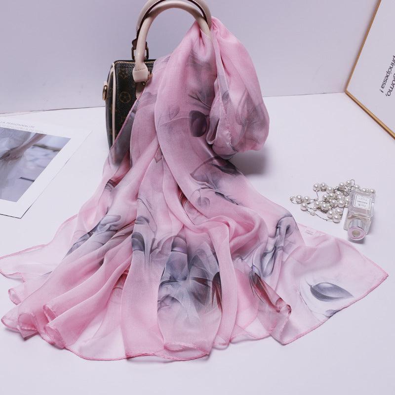 Pink tulle scarf with soft floral print and flowing drape