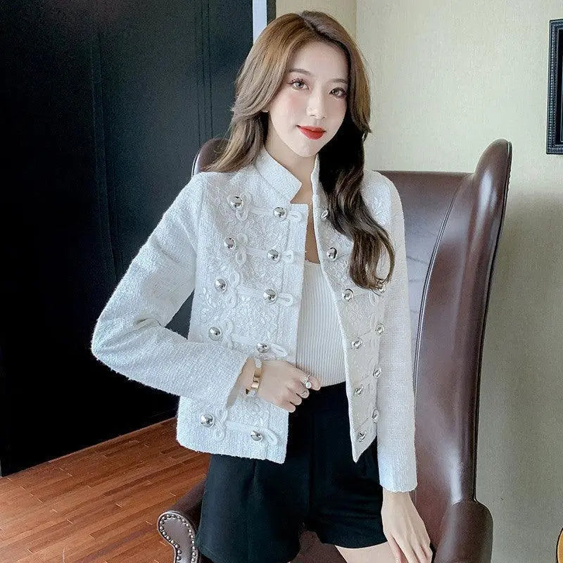 White embellished stand-collar cropped jacket with metallic button details on front