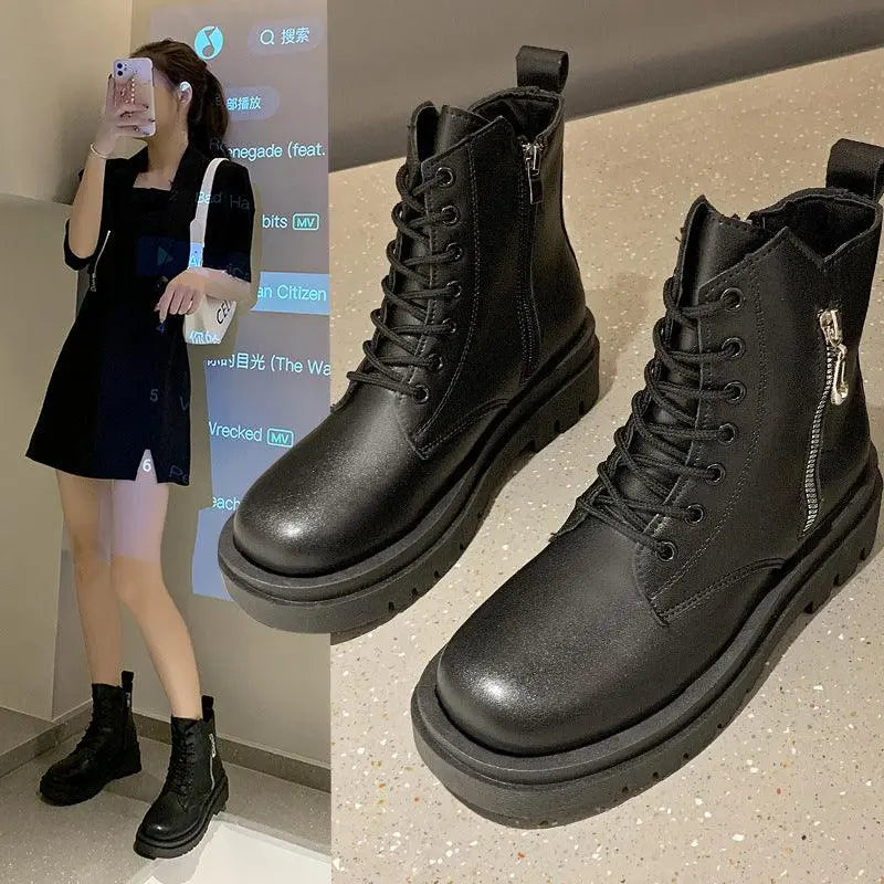 Black lace-up ankle boots with thick platform sole and chunky heel.