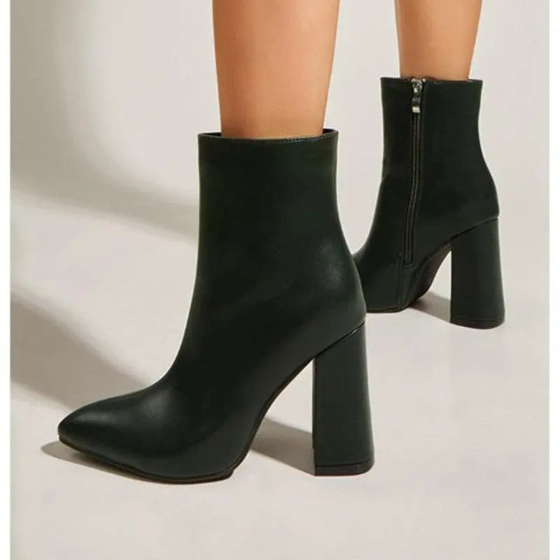 Black high-heeled ankle boots with side zipper and pointed toe, chunky block heel
