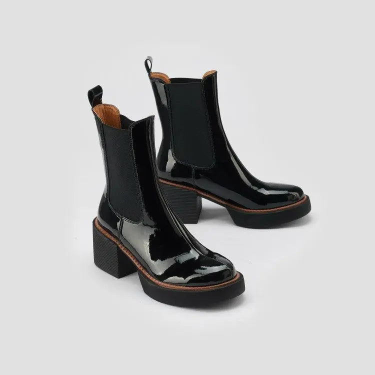 Black glossy Chelsea boots with elastic side panels and medium block heel