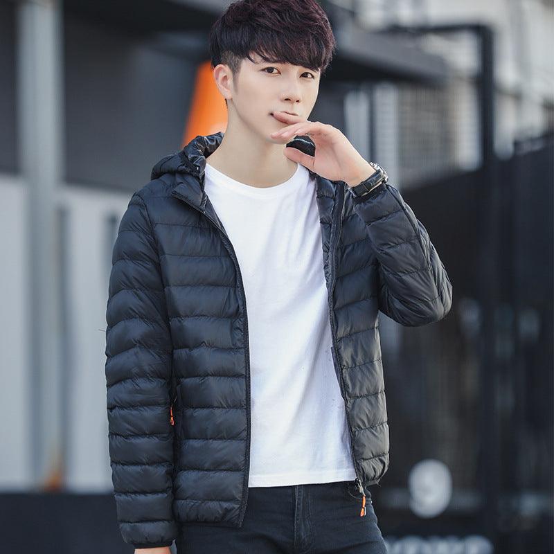 Men's hooded padded jacket in dark color, full-zip front with quilted baffles.