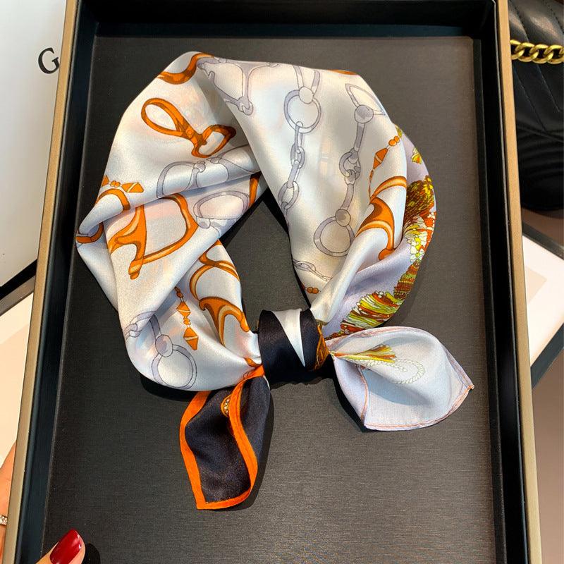 Small scarf, light beige with orange abstract and chain motifs, knotted ends