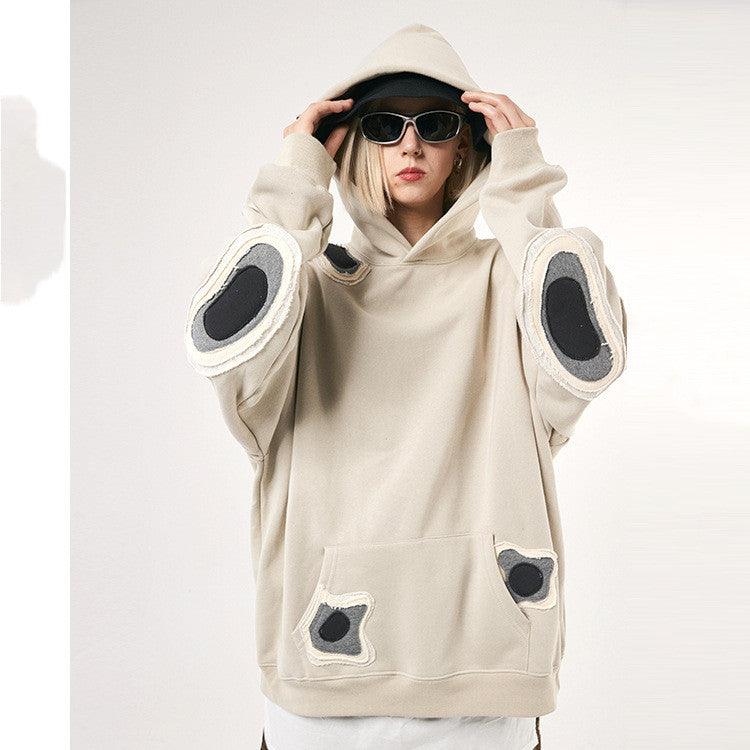 Sand hooded loose sweater with front pocket and oval patch details on sleeves and chest