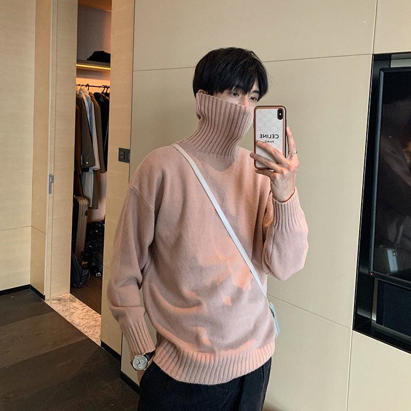 Men's pink ribbed turtleneck knit sweater with long sleeves and hem cuffs