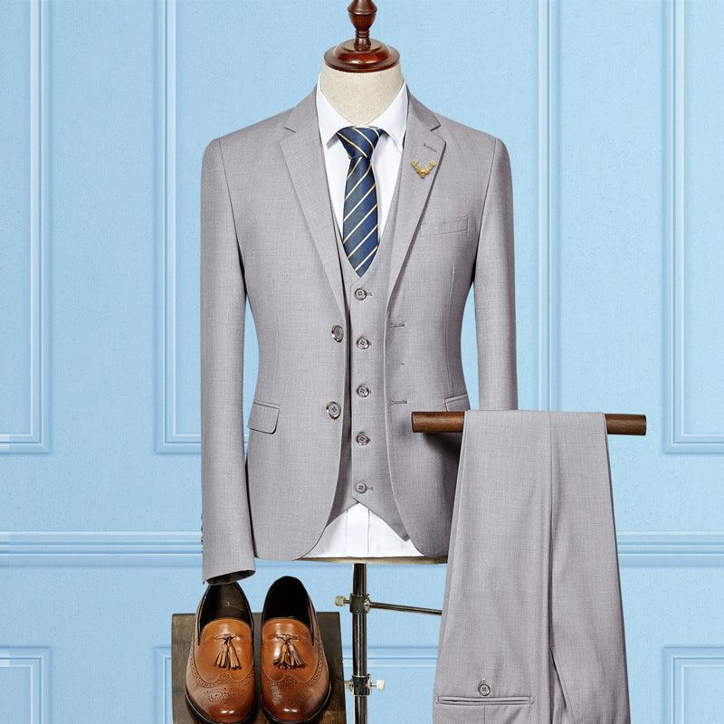 Light grey slim fit three-piece wedding suit: jacket, vest, and matching trousers