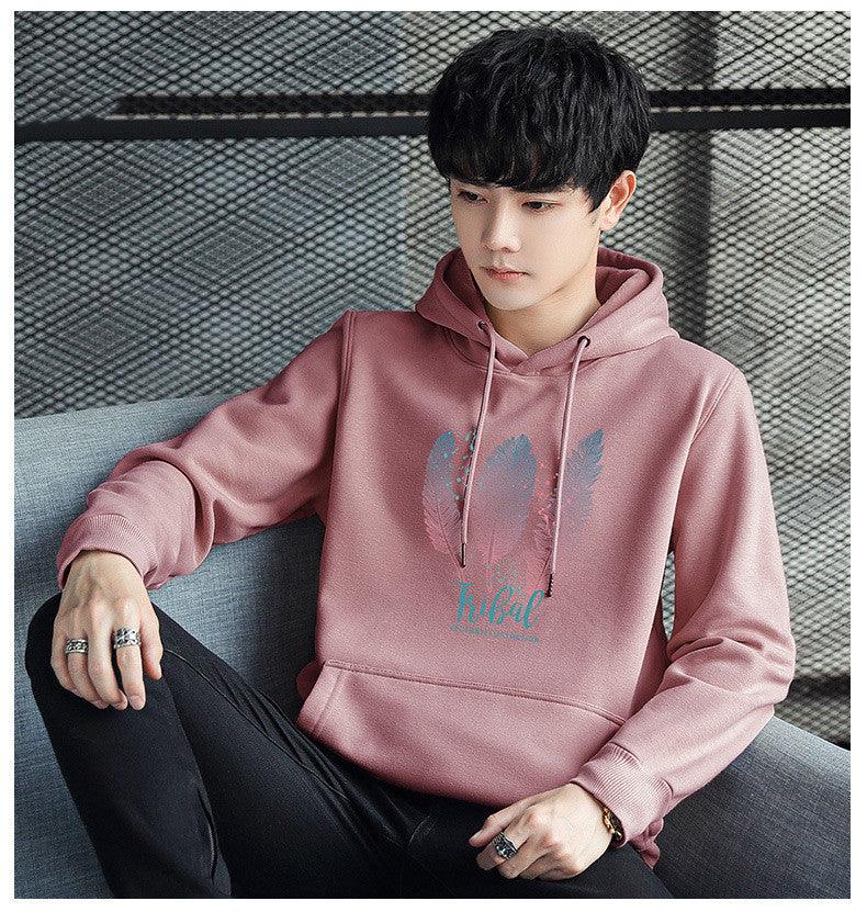 Mauve hooded cotton pullover sweatshirt with drawstring and feather graphic print.