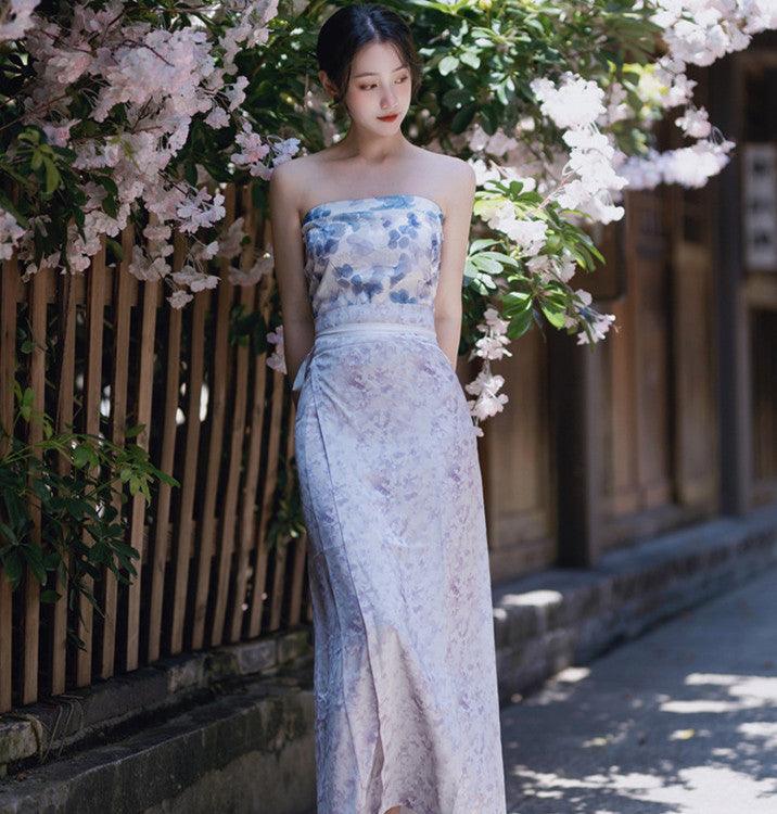 Light-blue floral strapless long dress with fitted waist and floor-length skirt