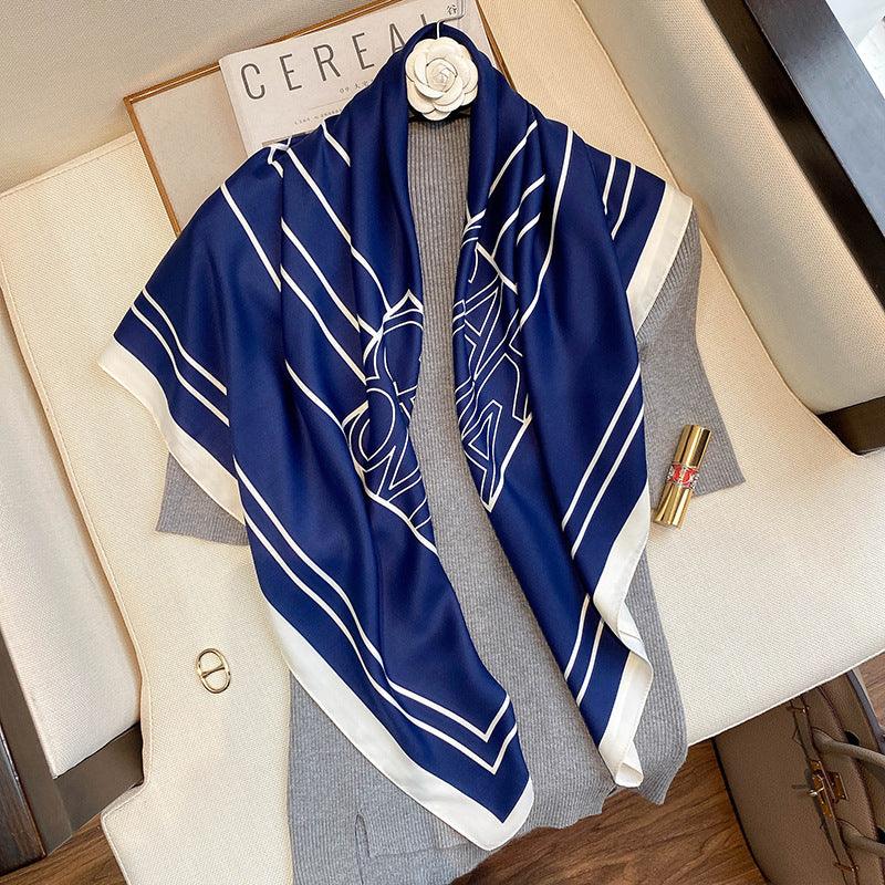 Women's silk scarf in navy with white line pattern and light gray border