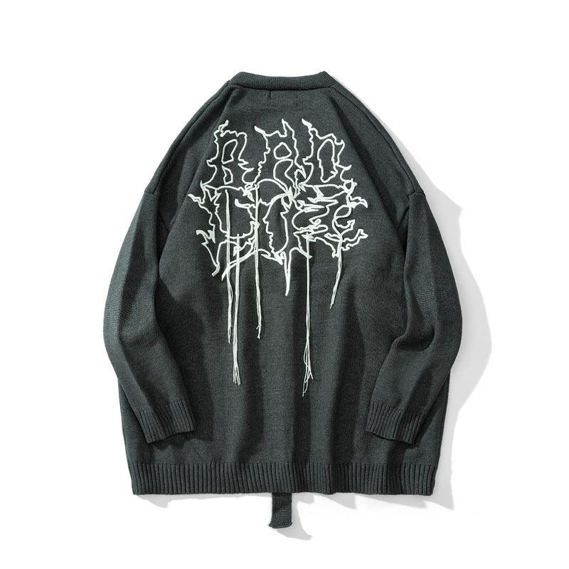 Dark green wool V-neck cardigan back view with large white line-art graphic