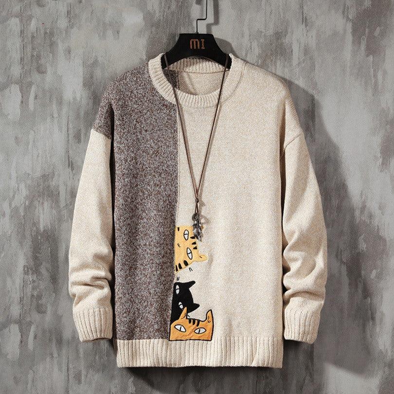 Men's thick knit sweater with cream and speckled brown panels and cartoon chest graphic