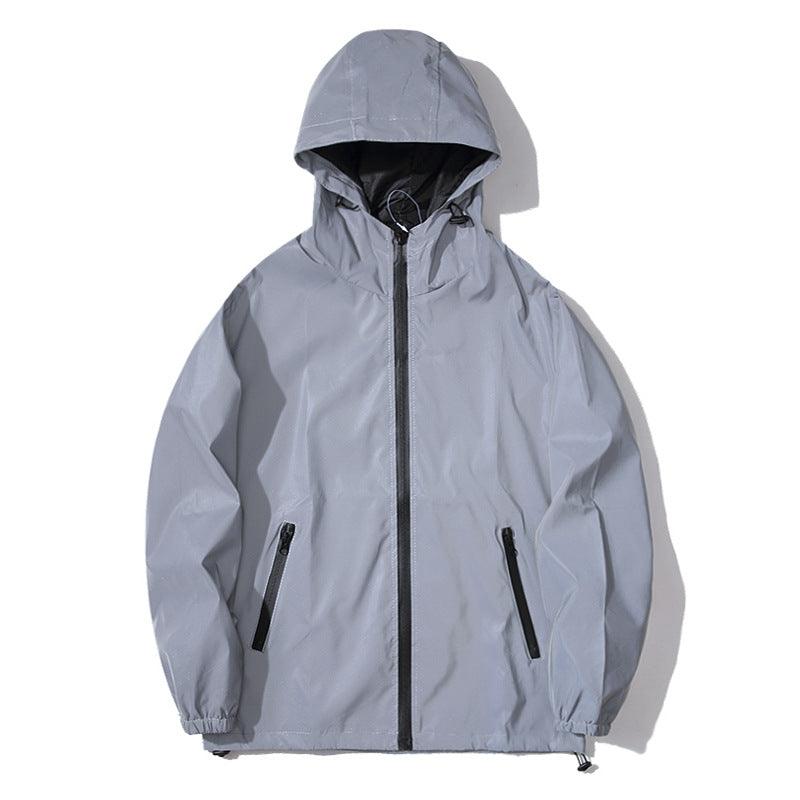 Light grey hooded windbreaker jacket with black zipper and side zip pockets