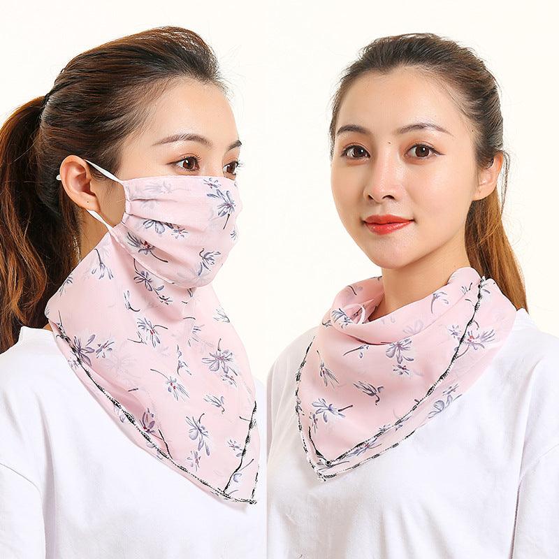 Light pink floral bib scarf with matching face covering, draped around neck