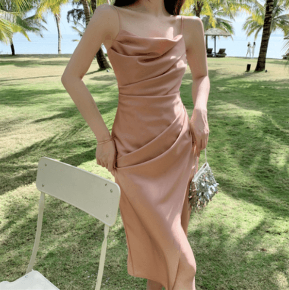 Blush satin suspender long skirt with cowl neckline and side slit