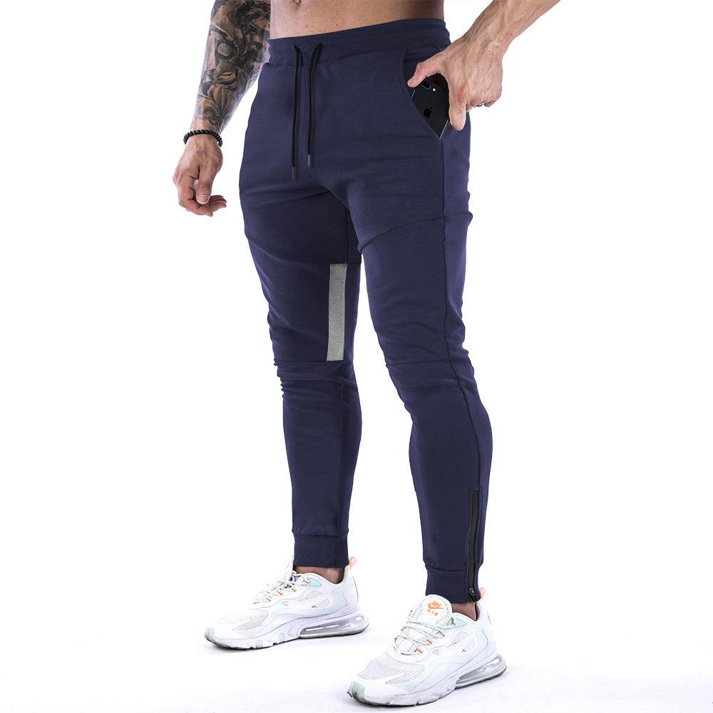 Men's fitness trousers in dark blue, drawstring waist, cuffed jogger hems