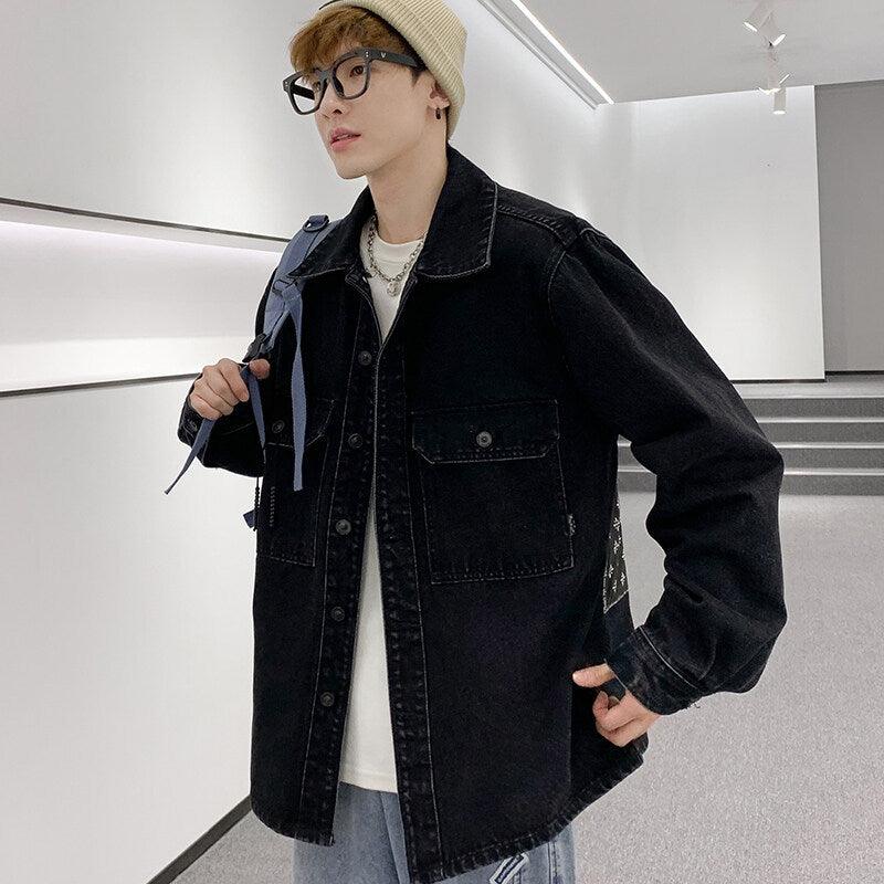 Men's black denim shirt jacket with button front and chest pockets