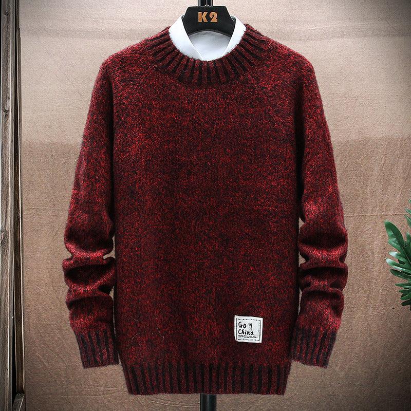 Burgundy heather knitted sweater with ribbed crew neck, long sleeves, and cuffs