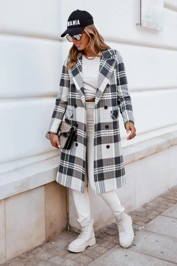 Grey plaid wool coat with double-breasted buttons, long sleeves, and front pockets