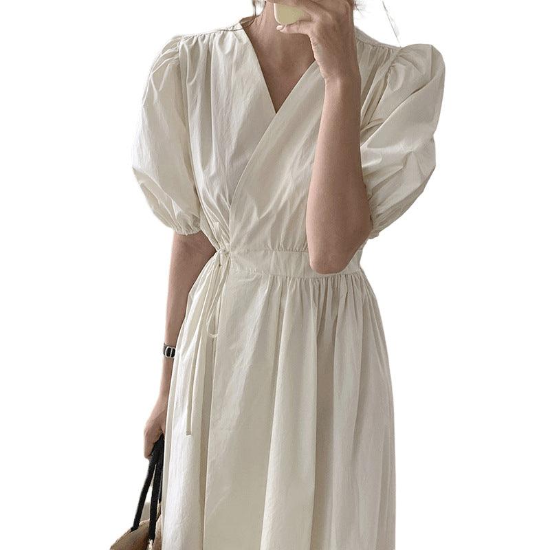 White puff-sleeve Kikyou dress with V-neck and ruched waist, midi length