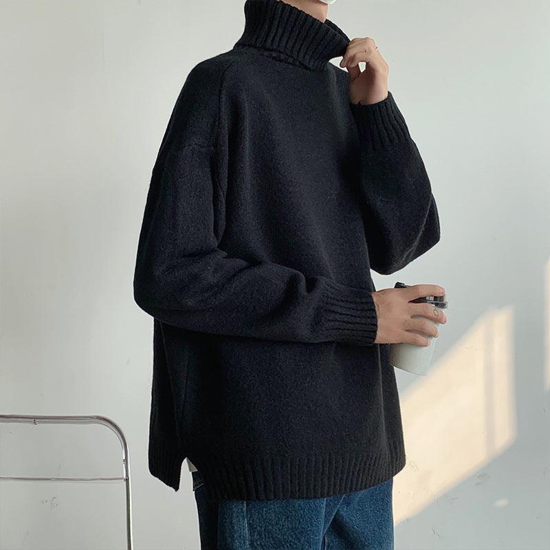 Black loose turtleneck sweater with ribbed collar and wide sleeves