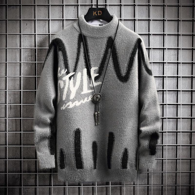 Gray half turtleneck knit sweater with black abstract lettering and center button placket