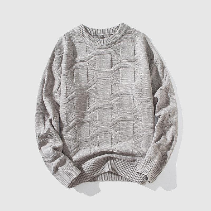 Light gray round-neck textured knit sweater with ribbed collar, cuffs, and hem