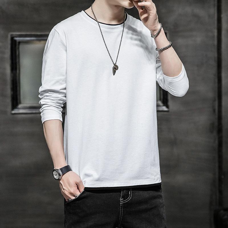 White long-sleeve crewneck T-shirt, relaxed fit, ribbed collar and cuffs.