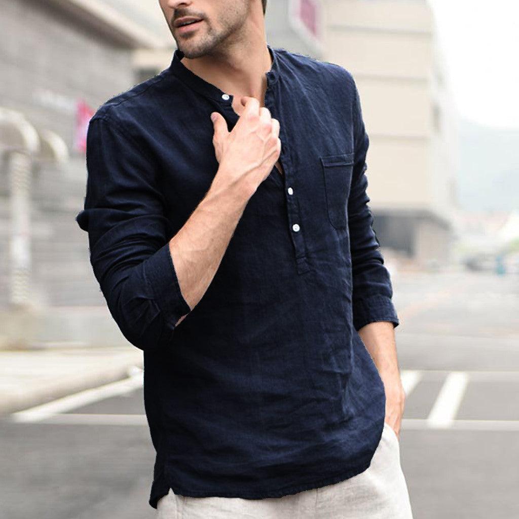 Men's navy button-up shirt with long sleeves and chest pocket, split neckline, unbuttoned cuffs