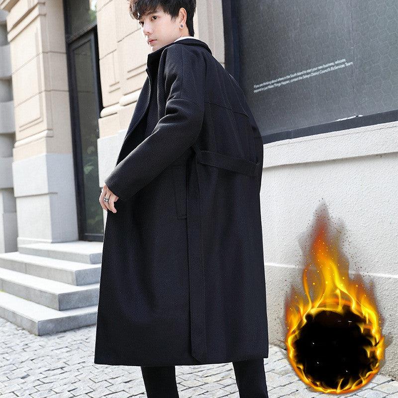 Black long trench coat with notched lapels and long sleeves, side slit hem