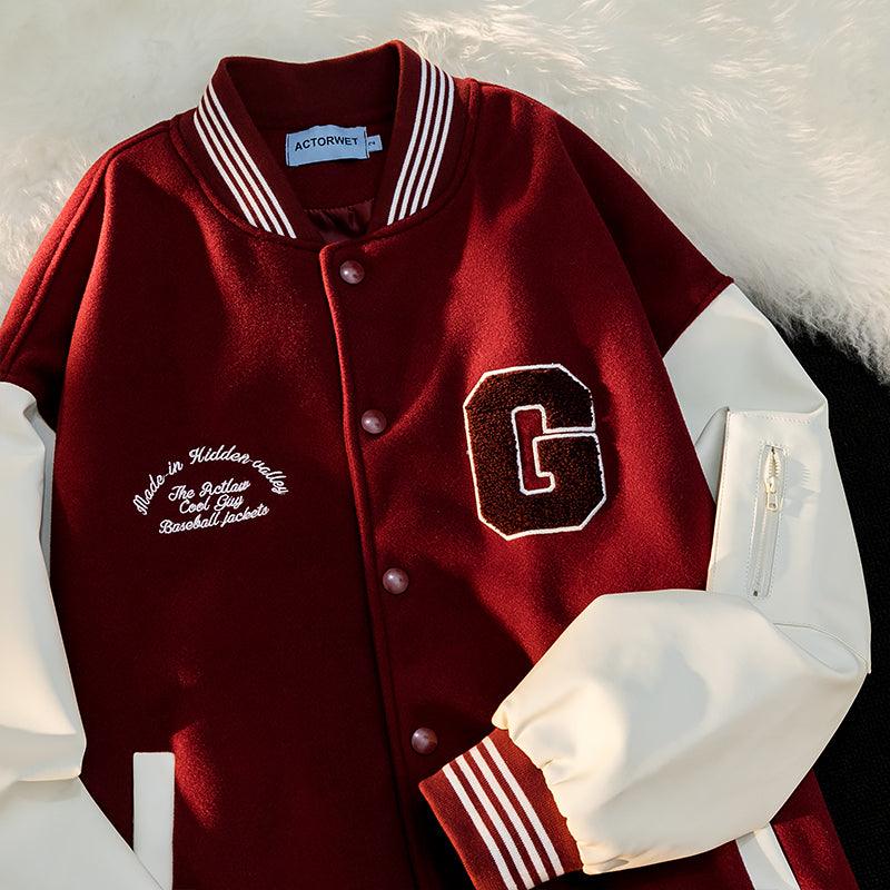 Red satin-look jacket with snap front and striped collar, featuring a large embroidered “G”