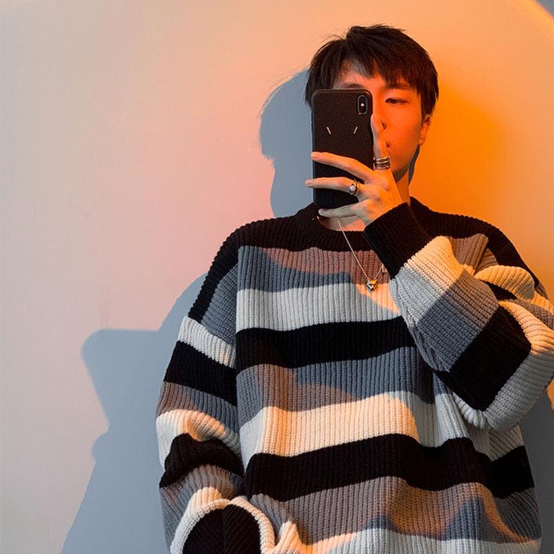 Striped round-neck sweater with ribbed cuffs, black and cream with muted blue bands