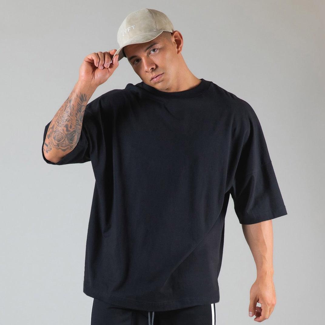 Men's casual running t-shirt, black crew neck, short sleeves.