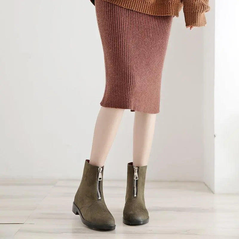 Olive lightweight rubber ankle boots with side zippers and low block heels