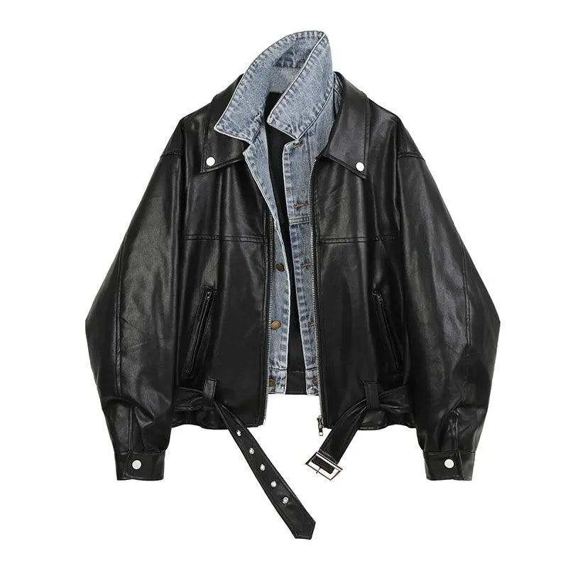 Black leather jacket with light denim collar, front snap pockets, and adjustable belt strap