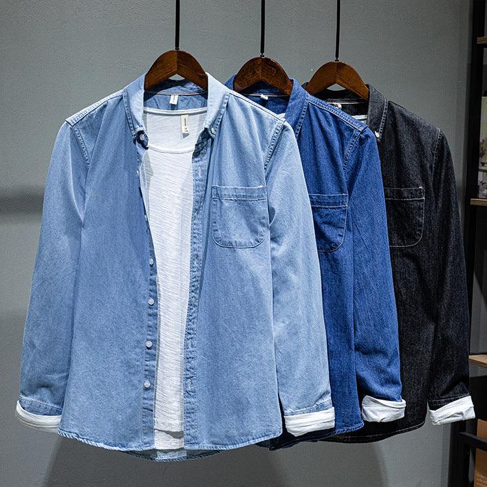 Light blue denim shirt jacket with long sleeves, button front, and chest pocket